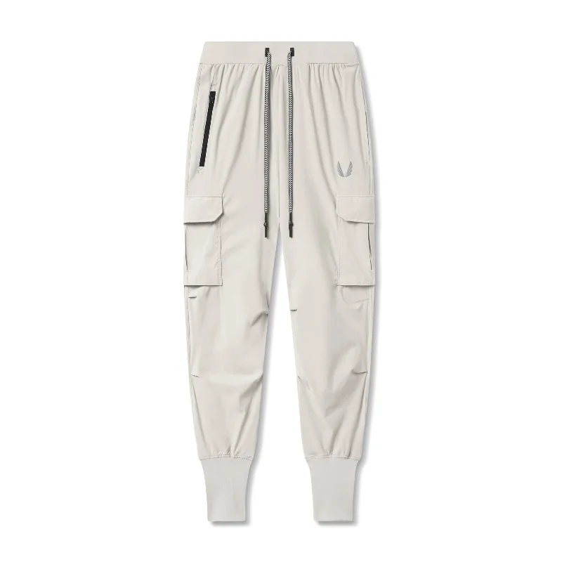 Now Available 0825. Tetra-Lite® Cargo High Rib Jogger - Stone "Reflective"